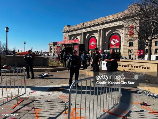Kansas City police are seen at Union Station, where a shooting broke out during the Chiefs' Super Bowl victory rally on Wednesday, Feb. 14 in Kansas...