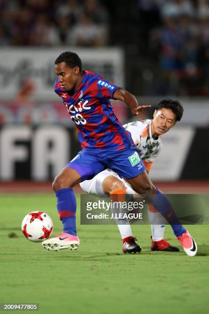 Wilson Rodrigues Fonseca of Ventforet Kofu controls the ball against Mitsunari Musaka of Shimizu S-Pulse during the J.League J1 match between...