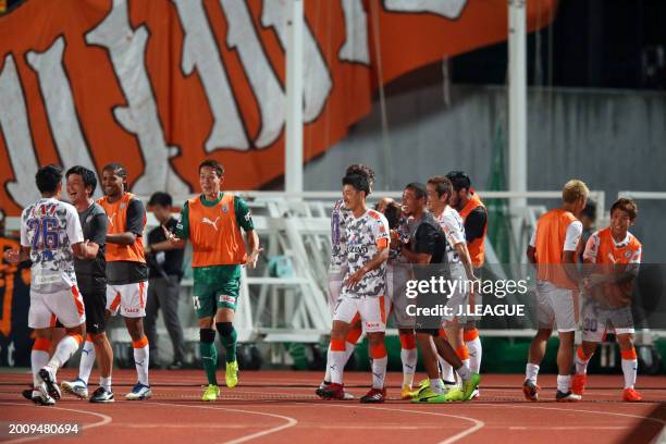 Shimizu S-Pulse players celebrate the team's first goal scored by Koya Kitagawa during the J.League J1 match between Ventforet Kofu and Shimizu...