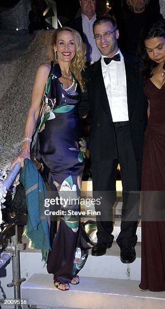 Model Jerry Hall and friend prodcuer George Waud attend the MTV/T3 party at Pierre Cardin's Villa during 56th International Cannes Film Festival 2003...