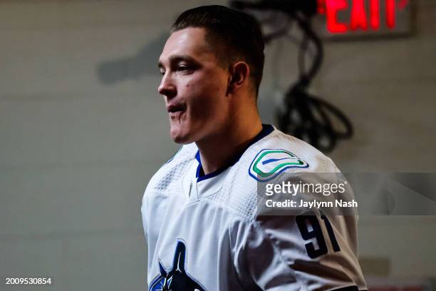 Nikita Zadorov of the Vancouver Canucks looks on before the first period of the game against the Carolina Hurricanes at PNC Arena on February 06,...