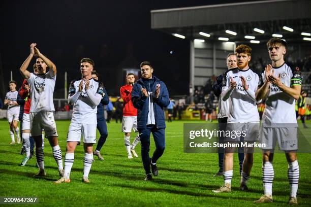 Dublin , Ireland - 16 February 2024; Sligo Rovers manager John Russell, centre, applauds the Sligo Rovers supporters after the SSE Airtricity Men's...