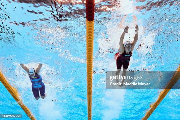 Lana Pudar of Team Bosnia and Boglarka Kapas of Team Hungary compete in the Women's 200m Butterfly Heat 3 on day thirteen of the Doha 2024 World...