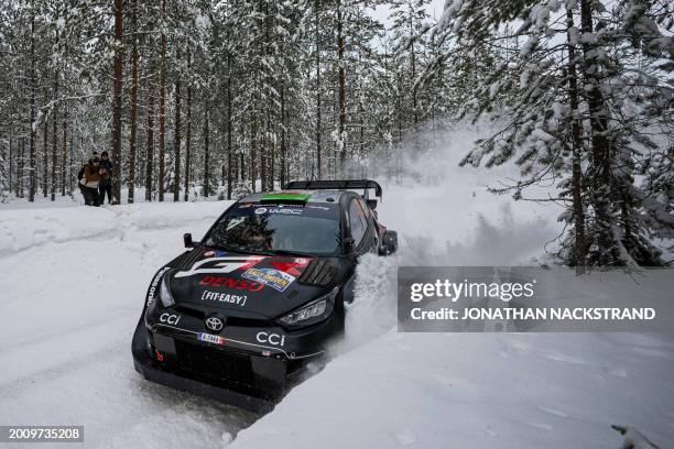 Elfyn Evans of Great Britain and his co-driver Scott Martin of Great Britain steer their Toyota GR Yaris Rally1 HYBRID during the Sarsjoliden, 10th...