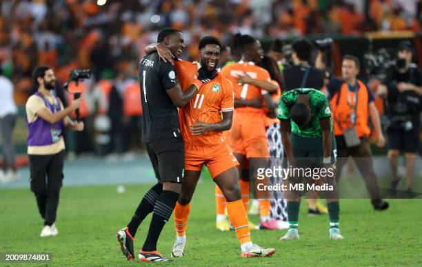 Jean-Philippe Krasso and Yahia Fofana of Ivory Coast celebrate after Ivory Coast won the Africa Cup of Nations 2024 ,during the TotalEnergies CAF...