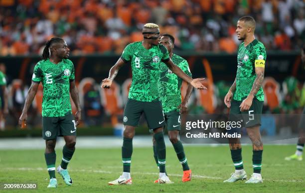 Victor Osimhen of Nigeria argues with team mates William Troost-Ekong and Moses Simon ,during the TotalEnergies CAF Africa Cup of Nations final match...