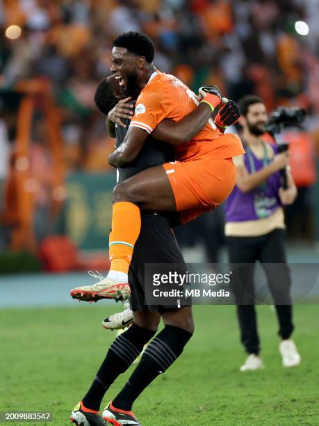 Jean-Philippe Krasso and Yahia Fofana of Ivory Coast celebrate after Ivory Coast won the Africa Cup of Nations 2024 ,during the TotalEnergies CAF...