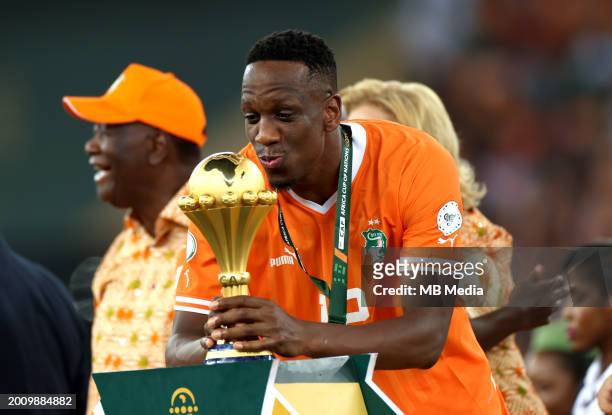 Willy Boly of Ivory Coast kiss the Africa Cup of Nations trophy on the podium after Ivory Coast won the Africa Cup of Nations 2024 final football...