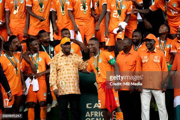 Ivory Coast's forward Max-Alain Gradel with the President of Ivory Coast Alassane Ouattara after Ivory Coast won the Africa Cup of Nations 2024 final...