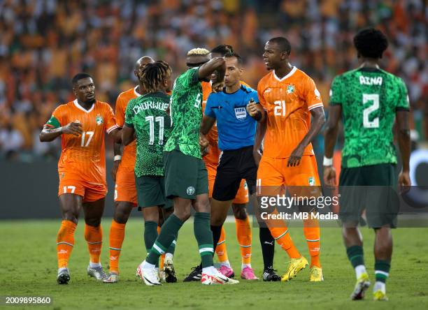 Victor Osimhen of Nigeria arguesl with Evan Ndicka of Ivory Coast ,during the TotalEnergies CAF Africa Cup of Nations final match between Nigeria and...