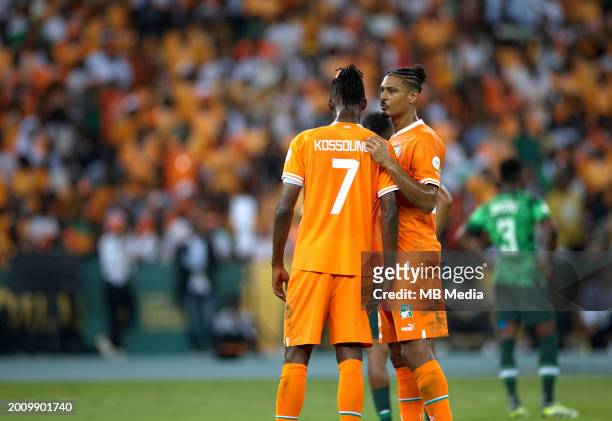 Sébastien Haller of Ivory Coast talk with Kossounou Odilon of Ivory Coast ,during the TotalEnergies CAF Africa Cup of Nations final match between...