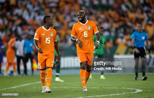 Seko Fofana of Ivory Coast talk with Max-Alain Gradel of Ivory Coast ,during the TotalEnergies CAF Africa Cup of Nations final match between Nigeria...