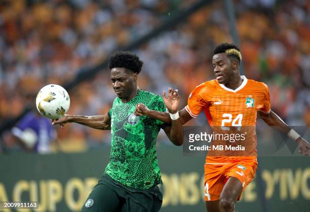 Ola Aina of Nigeria competes for the ball with Simon Adingra of Ivory Coast ,during the TotalEnergies CAF Africa Cup of Nations final match between...