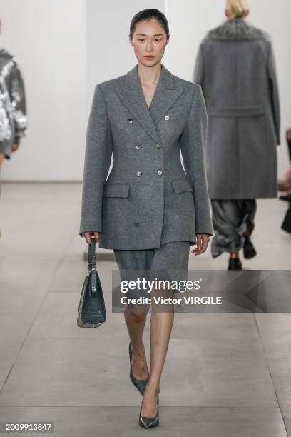 Model walks the runway during the Michael Kors Ready to Wear Fall/Winter 2024-2024 fashion show as part of the New York Fashion Week on February 13,...