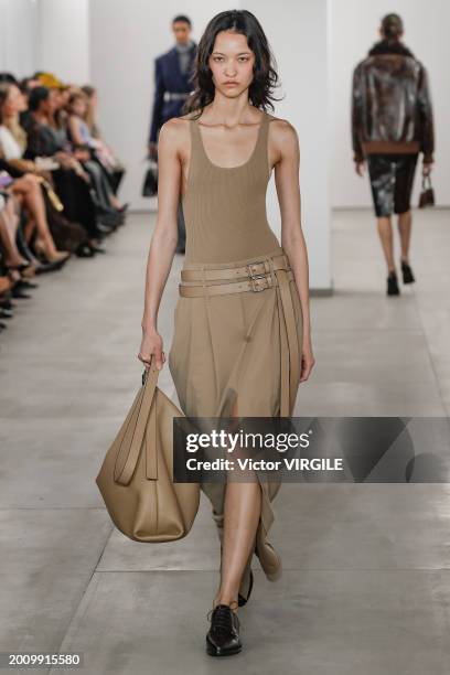 Model walks the runway during the Michael Kors Ready to Wear Fall/Winter 2024-2024 fashion show as part of the New York Fashion Week on February 13,...