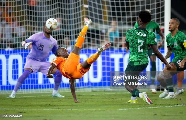 Max-Alain Gradel of Ivory Coast competes for the ball with Ola Aina of Nigeria ,during the TotalEnergies CAF Africa Cup of Nations final match...