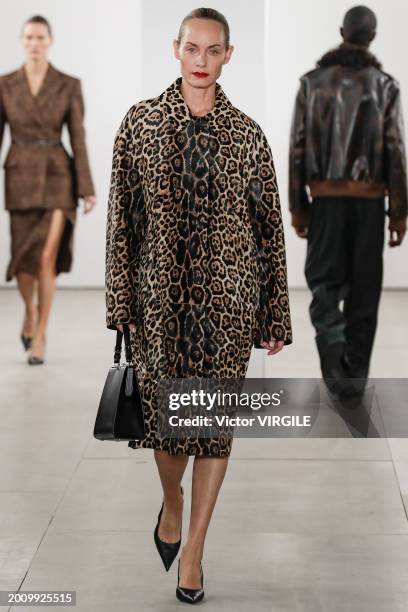 Amber Valletta walks the runway during the Michael Kors Ready to Wear Fall/Winter 2024-2024 fashion show as part of the New York Fashion Week on...