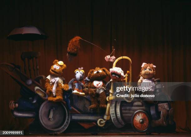 Jim Henson's Muppets visit London during The Muppet Show on Tour in 1987. In left to right: Fozzie, Gonzo, Rowlf, Animal and Miss Piggy on stage.