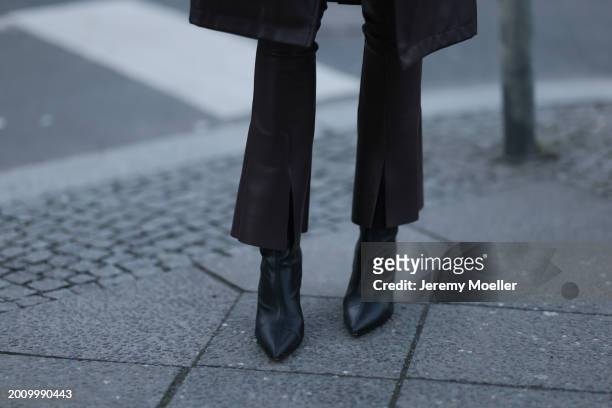 Celine Bethmann seen wearing Norma Kamali brown leather wide leg pants / leggings pants, Liu Jo brown leather midi length coat and Liu Jo black...