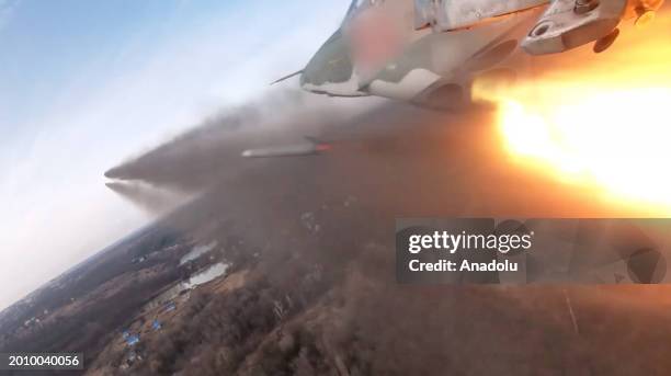 Screen grab captured from a video shows the side, cockpit views of an attack aircraft, with which crews on Su-25 aircraft carried out a strike with...