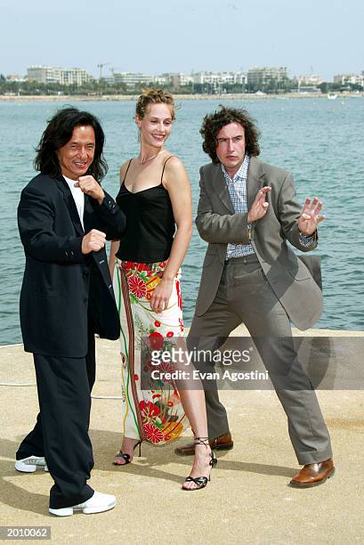 Actors Jackie Chan, Cecile de France, Steve Coogan pose during the photocall for "Around the World in 80 Days" at the Majestic Pier during 56th...