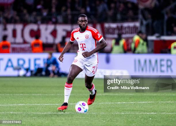 Dayot Upamecano of Muenchen runs with the ball during the Bundesliga match between Bayer 04 Leverkusen and FC Bayern Muenchen at BayArena on February...