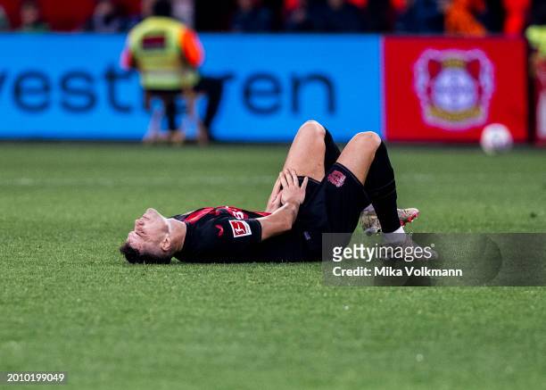 Granit Xhaka of Leverkusen with pain on the pitch during the Bundesliga match between Bayer 04 Leverkusen and FC Bayern Muenchen at BayArena on...