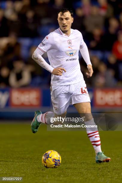 Josh Earl of Barnsley runs with the ball during the Sky Bet League One match between Shrewsbury Town and Barnsley at Croud Meadow on February 13,...