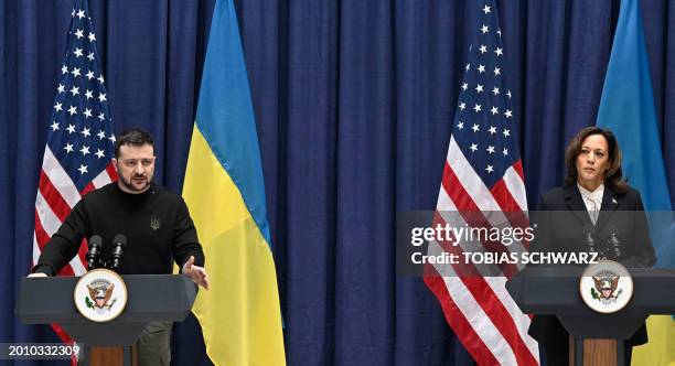 Ukrainian President Volodymyr Zelensky and US Vice President Kamala Harris shake give a joint press conference at the Munich Security Conference in...