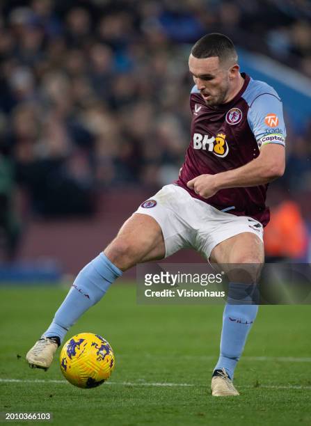 John McGinn of Aston Villa in action during the Premier League match between Aston Villa and Manchester United at Villa Park on February 11, 2024 in...