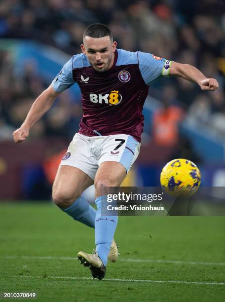 John McGinn of Aston Villa in action during the Premier League match between Aston Villa and Manchester United at Villa Park on February 11, 2024 in...