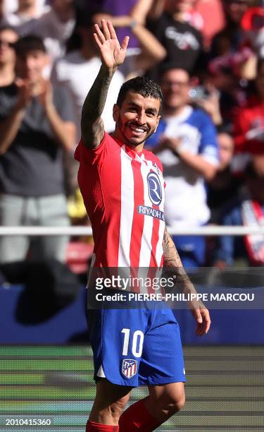 Atletico Madrid's Argentinian forward Angel Correa celebrates scoring his team's third goal during the Spanish league football match between Club...