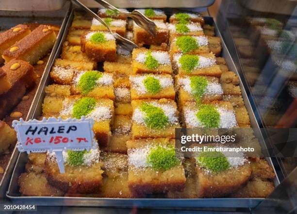 close up of turkish sweets at a store display in izmir. - turkish delight stock pictures, royalty-free photos & images