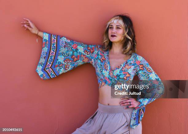 young woman in hippie clothes - floral pattern trousers stock pictures, royalty-free photos & images