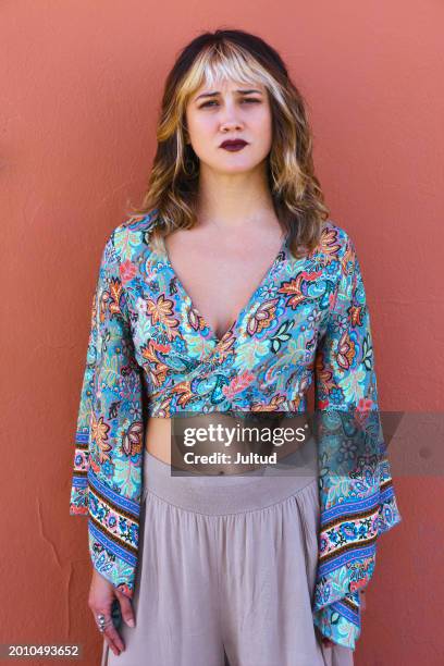 young woman in hippie clothes - floral pattern trousers stock pictures, royalty-free photos & images