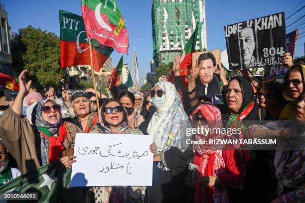 Supporters of former prime minister Imran Khan's Pakistan Tehreek-e-Insaf party protest against the alleged skewing in Pakistan's national election...