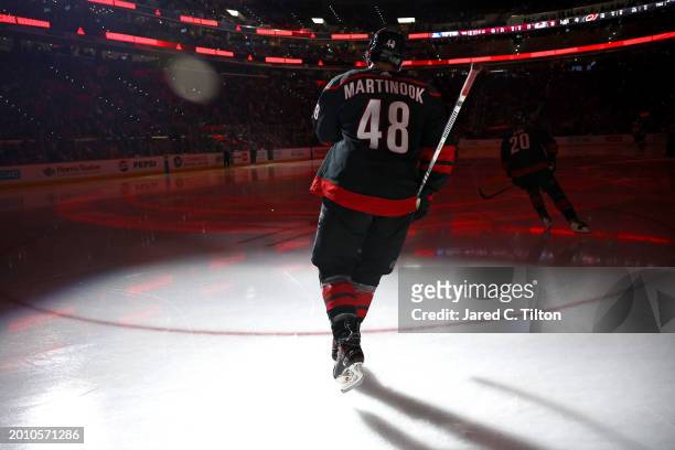 Jordan Martinook of the Carolina Hurricanes takes the ice prior to the third period of the game against the Colorado Avalanche at PNC Arena on...