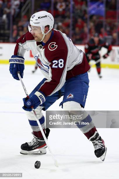 Miles Wood of the Colorado Avalanche skates with the puck during the third period of the game against the Carolina Hurricanes at PNC Arena on...