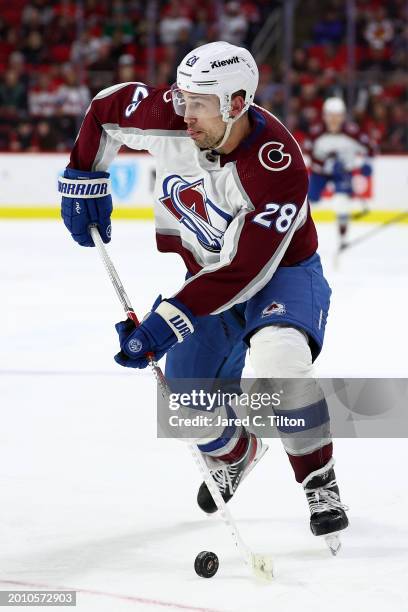 Miles Wood of the Colorado Avalanche skates with the puck during the third period of the game against the Carolina Hurricanes at PNC Arena on...
