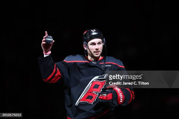 Michael Bunting of the Carolina Hurricanes reacts after being named "third star" following their 5-2 victory over the Colorado Avalanche at PNC Arena...