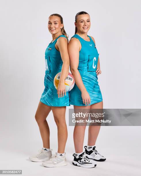 Beth Dix and Mikki Austin of Surrey Storm pose during the Netball Super League Media Day Portrait Session at the Radisson Blu Hotel, East Midlands...