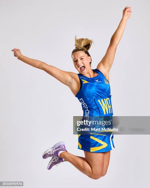 Bethan Dyke of Team Bath poses during the Netball Super League Media Day Portrait Session at the Radisson Blu Hotel, East Midlands Airport on...