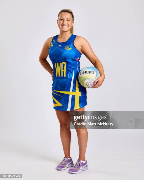 Bethan Dyke of Team Bath poses during the Netball Super League Media Day Portrait Session at the Radisson Blu Hotel, East Midlands Airport on...