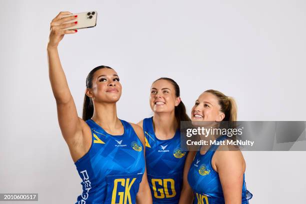 Jayda Pechova, Bethan Dyke and Tash Pavelin of Team Bath pose during the Netball Super League Media Day Portrait Session at the Radisson Blu Hotel,...