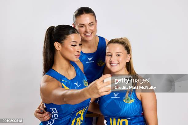 Jayda Pechova, Bethan Dyke and Tash Pavelin of Team Bath pose during the Netball Super League Media Day Portrait Session at the Radisson Blu Hotel,...