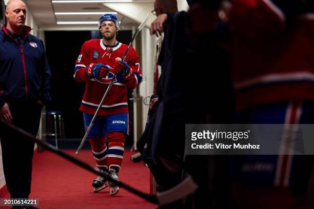 Brandon Gignac of the Montreal Canadiens walks down the corridor from the locker room before the warm-up period of the NHL regular season game...