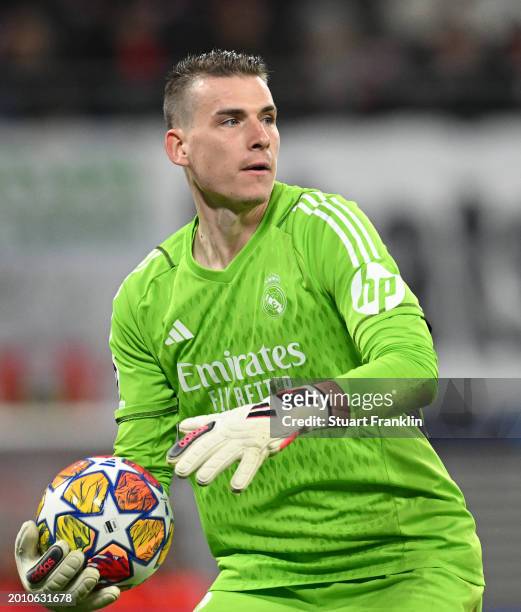 Andriy Lunin of Real Madrid in action during the UEFA Champions League 2023/24 round of 16 first leg match between RB Leipzig and Real Madrid CF at...