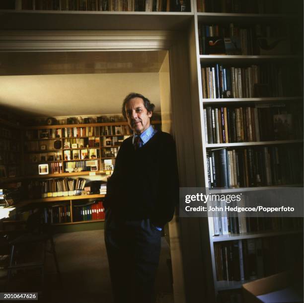 English author Malcolm Bradbury stands in the doorway of a library and office at home in England in 1996. Bradbury was appointed Professor of...