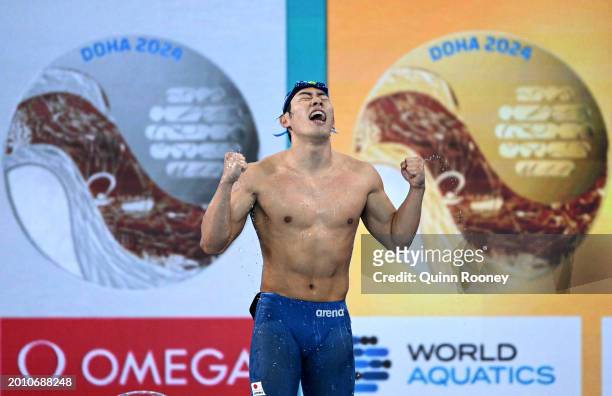 Tomoru Honda of Team Japan celebrates after winning gold in the Men's 200m Butterfly Final on day thirteen of the Doha 2024 World Aquatics...