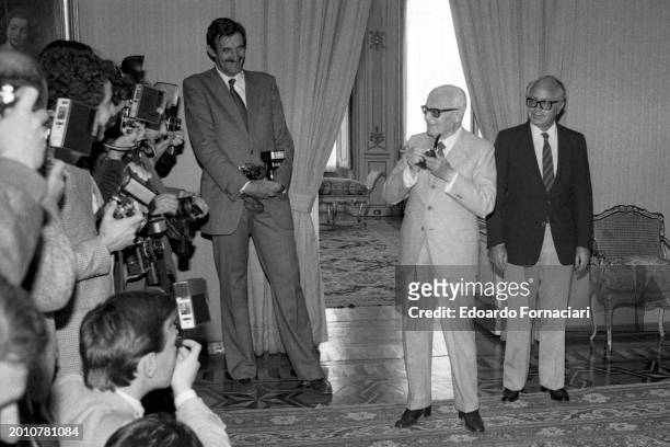 President of the Italian Republic Sandro Pertini, accompanied by the Secretary General of the Presidency of the Republic Antonio Maccanico, jokes...